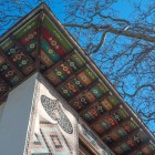 The wooden eaves of the Sheki Khan’s Palace, painted with geometric and floral motifs, combine decorative elegance and protective function typical of Azerbaijani art.