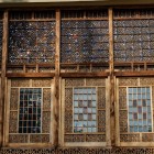 The shebeke windows of the Sheki Khan’s Palace, made of carved wood and colored glass, create refined light effects typical of traditional Azerbaijani art.