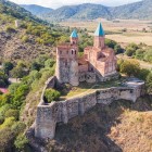 The beautiful Gremi fortress overlooks the hill in Georgia: a historic architectural symbol and fascinating tourist site set in a scenic landscape.