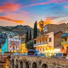 In Tbilisi’s old town, among wooden balconies, colorful facades and sunset lights, a romantic atmosphere unfolds where East and West meet.