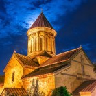 Sioni Cathedral, a masterpiece of Georgia’s Golden Age, blends a domed basilica with austere lines in warm tuff stone, symbol of faith and resilience.