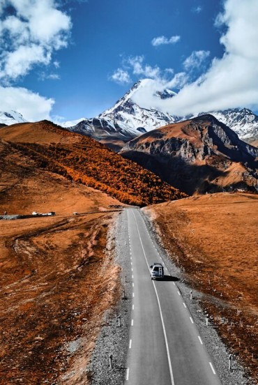 Scenic road to majestic Mount Kazbek, the third highest peak in Georgia in the Greater Caucasus. Arrival in Stepantsminda and at the stunning Gergeti Church amid breathtaking landscapes.