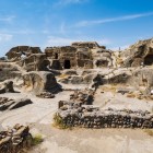 Ancient rock-carved dwellings in the cave city of Uplistsikhe, one of Georgia’s most fascinating archaeological sites, a witness to millennia of history.