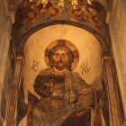 Mtskheta, Georgia. Close-up of the image of Jesus Christ painted on the interior wall fresco of Svetitskhoveli Cathedral, one of the oldest and most sacred sites of Georgian Orthodox tradition.