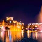 The Singing and Dancing Fountains in Republic Square, Yerevan, illuminated by city lights at night, creating a spectacular show of water, music and colors in the heart of the city.