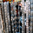 Handmade jewelry at Yerevan’s Vernissage Market, featuring necklaces and traditional metal accessories with refined details and authentic Armenian style.