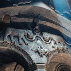 Carved details inside Geghard Monastery in Armenia, featuring symbolic motifs and medieval decorations: a unique example of rock-hewn art among UNESCO treasures of the Caucasus.