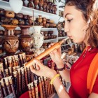 Handcrafted musical instruments at Yerevan’s Vernissage Market, with wooden flutes and traditional items reflecting Armenian culture, art and local traditions.