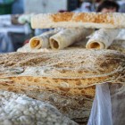 Armenian lavash is thin and flexible, with a delicate toasted flavor, a warm bread aroma, and a texture that can be soft or crispy.