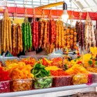 Churchkhela and chiri, traditional Georgian sweets, displayed at Kutaisi’s Green Bazaar. Authentic flavors of grape must, nuts and dried fruits.