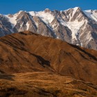 Mount Shkhara, Georgia’s highest peak at 5,086 meters, dominates Svaneti with imposing glaciers and breathtaking alpine landscapes.