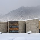Mestia Museum in Svaneti, a modern architectural landmark set among snowy mountains. A unique cultural site blending contemporary design and alpine scenery.