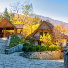 Charming stone street in the heart of Dilijan, surrounded by wooden houses and autumn nature. An authentic corner of Armenia with mountain charm and peaceful vibes.