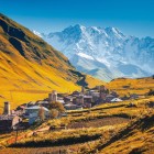 Ushguli, a high-altitude village at the foot of Mount Shkhara in the Enguri Gorge. A unique landscape of medieval towers and breathtaking Caucasus scenery.