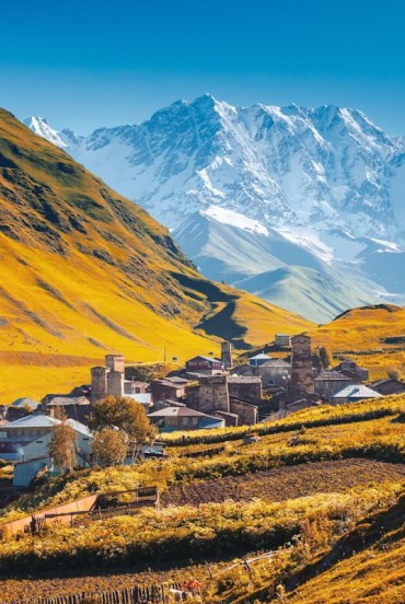 Ushguli, a high-altitude village at the foot of Mount Shkhara in the Enguri Gorge. A unique landscape of medieval towers and breathtaking Caucasus scenery.