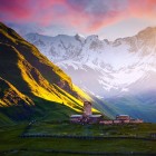 Evening view of Lamaria Church in Ushguli, at the foot of Mount Shkhara. A unique Caucasus landscape blending nature, history and enchanting atmosphere.