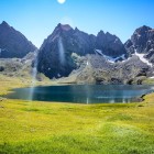 The stunning Tobavarchkhili Lake in the Samegrelo mountains, surrounded by lush nature and alpine landscapes, offers breathtaking summer views in Georgia.