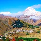 Stepantsminda (Kazbegi) is a charming village in northern Georgia, at the foot of the majestic Mount Kazbek (5,047 m), surrounded by alpine valleys, traditional houses and stunning Caucasus landscapes.