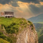 The Georgian–Russian Friendship Monument overlooks the gorges of Gudauri from a spectacular viewpoint along the historic Georgian Military Highway.