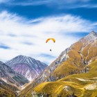 Paragliding above the peaks of Gudauri, offering a unique perspective over the Caucasus mountains and the wide-open landscapes of highland Georgia.