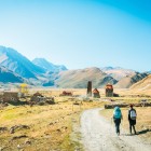 Trail in Truso Valley toward the nunnery, among ancient stone towers, remote villages and wide Georgian Caucasus landscapes.