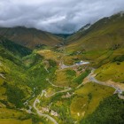 Descending trail toward Kvesheti, through open valleys, mountain switchbacks and Caucasus landscapes marking the return from Khada Valley.