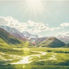 Wide view of Truso Valley, where braided rivers, alpine meadows and Caucasus mountains create one of Georgia’s most evocative landscapes.