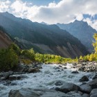 The source of the Mestiachala River originates from the Chalaadi Glacier at 1,920 meters, among rocks and ice, in a pristine alpine setting in Svaneti.