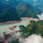 Enguri Dam opens between mountains and wild nature, creating a wide and quiet scenery where water and landscape blend in perfect harmony.