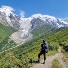 The Adishi Glacier in the Greater Caucasus of Svaneti is reached crossing its valley, among open landscapes, alpine silence and ever-changing mountain scenery.