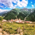 Adishi is a village in Svaneti, among mountains and silence. Svan architecture, with defensive towers and stone and wooden houses, is a popular destination for nature lovers and hikers.