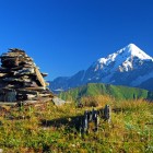 Mount Tetnuldi (4869 m) dominates Upper Svaneti with its twin peaks. Part of the Bezengi Wall, it rises among glaciers and crystalline rocks near the Russian border.