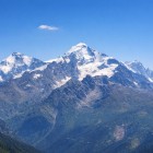 Shkhara (5193 m) rises into the clear sky, between snow and rock. Part of the Bezengi Wall massif, it dominates the Caucasus in the Svaneti valley, Georgia.