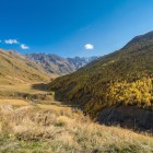 Autumn view of Zagar Pass (2620 m), between Ushguli and Sasashi. A high mountain pass linking Upper and Lower Svaneti with ridges and wide valleys.