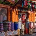 In the souks of Marrakech, shops and markets display spices, fabrics and traditional handicrafts from Morocco.