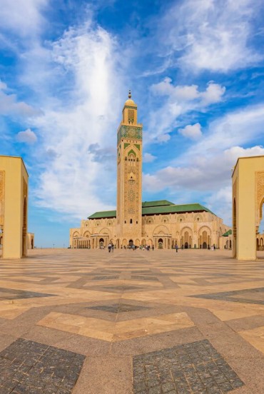 The Hassan II Mosque dominates Casablanca with its minaret overlooking the ocean. The vast marble square enhances the sense of space and harmony.