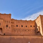 The façades of Kasbah Taourirt feature geometric decorations, recessed windows and earthen walls typical of southern Morocco.