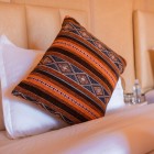 Details of a bed inside an elegant luxury camp in the fascinating desert of Merzouga, in the province of Errachidia, about 600 km from Marrakech.