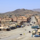 View of the city of Agdz in southern Morocco, among traditional houses, minarets and arid landscapes at the foot of the mountains.