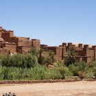 View of Zagora, an authentic city in southern Morocco, surrounded by red-earth kasbahs, lush palm groves, and Saharan landscapes along ancient caravan routes.