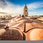 From the rooftops of Malaga Cathedral, breathtaking views unfold across the city. The majestic bell tower and Mediterranean skyline reveal the beauty of Andalusia.