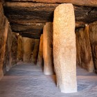 Inside the Menga Dolmen, massive stone pillars and monumental megalithic slabs reveal over 5,000 years of history in one of Europe's most remarkable prehistoric sites.