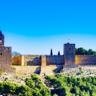 Antequera's Alcazaba rises above its ancient Moorish walls, offering breathtaking views and a journey through Andalusia's Islamic history among towers and ramparts.