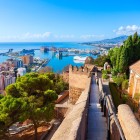 From Malaga's Alcazaba, sweeping views embrace the harbor, the Mediterranean and the city. An ancient Moorish fortress offering unforgettable Andalusian panoramas.