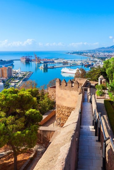 From Malaga's Alcazaba, sweeping views embrace the harbor, the Mediterranean and the city. An ancient Moorish fortress offering unforgettable Andalusian panoramas.