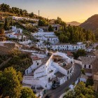 Facing the Alhambra, Sacromonte enchants visitors with its cave houses and the soul of flamenco. History, music and tradition reveal Granada's most authentic spirit.