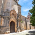 Santa María la Mayor Church overlooks the square with its majestic stone façade, telling centuries of history and showcasing the timeless charm of Andalusia.
