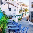 A charming corner of Mijas welcomes visitors with whitewashed houses, flower-filled balconies and outdoor cafés, reflecting the authentic spirit of one of Andalusia's finest villages.