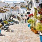 The charming streets of Mijas, lined with whitewashed houses, colorful flowerpots and scenic views, capture the authentic atmosphere of Andalusia's famous white villages.