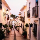 One of Mijas' characteristic streets features whitewashed houses, flower-filled balconies and stone paving, offering authentic views in the heart of the Costa del Sol.
